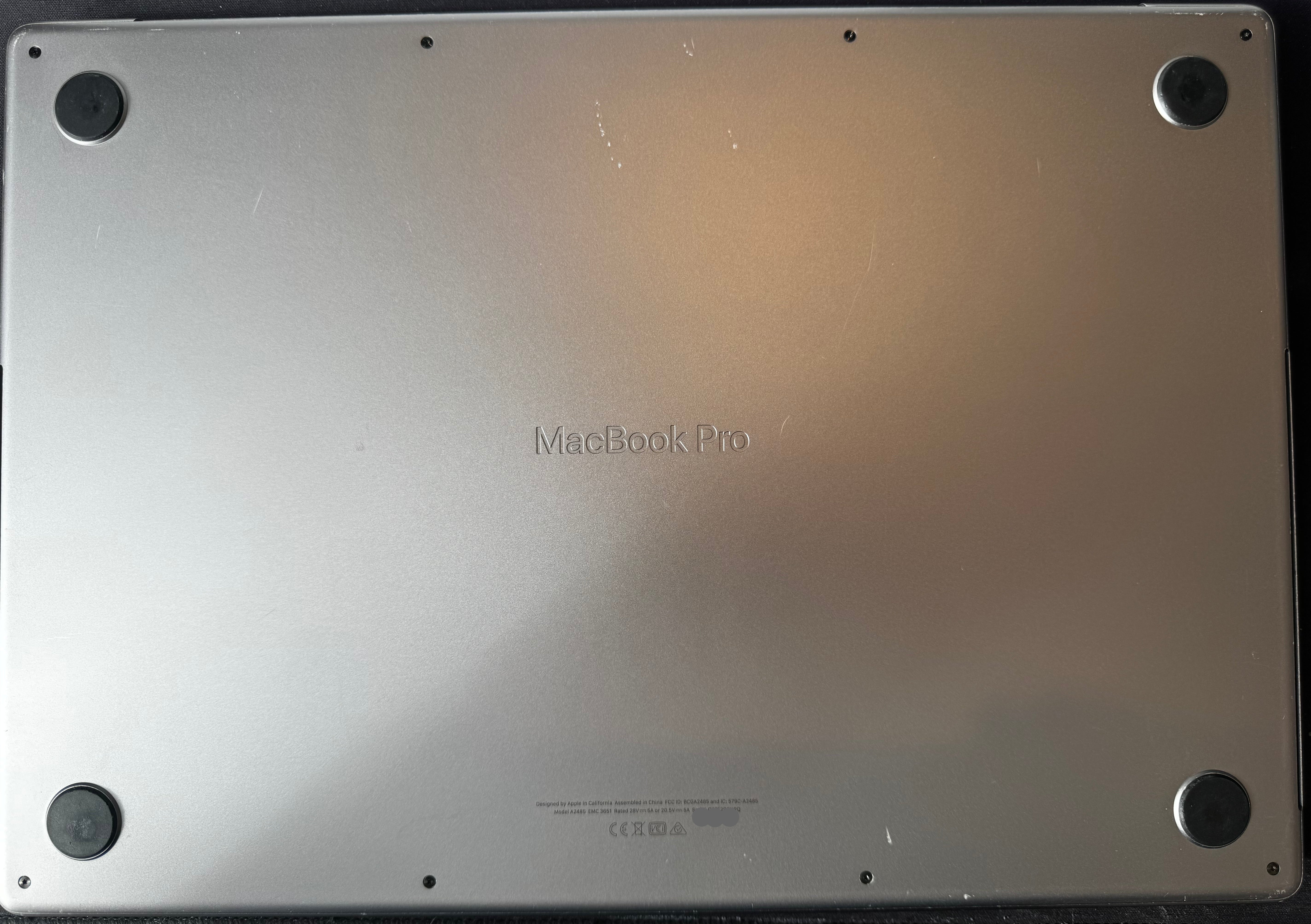 Back view of a MacBook Pro with visible branding